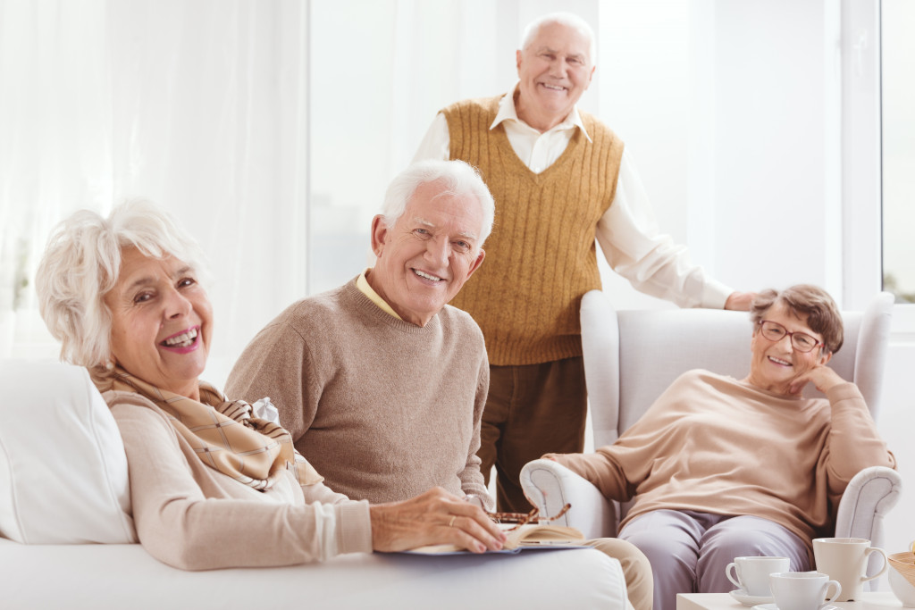 senior citizens at a lounge of a care facility