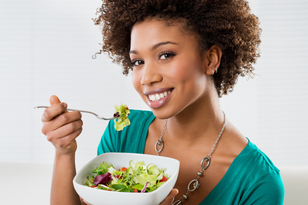 A woman eating healthy food